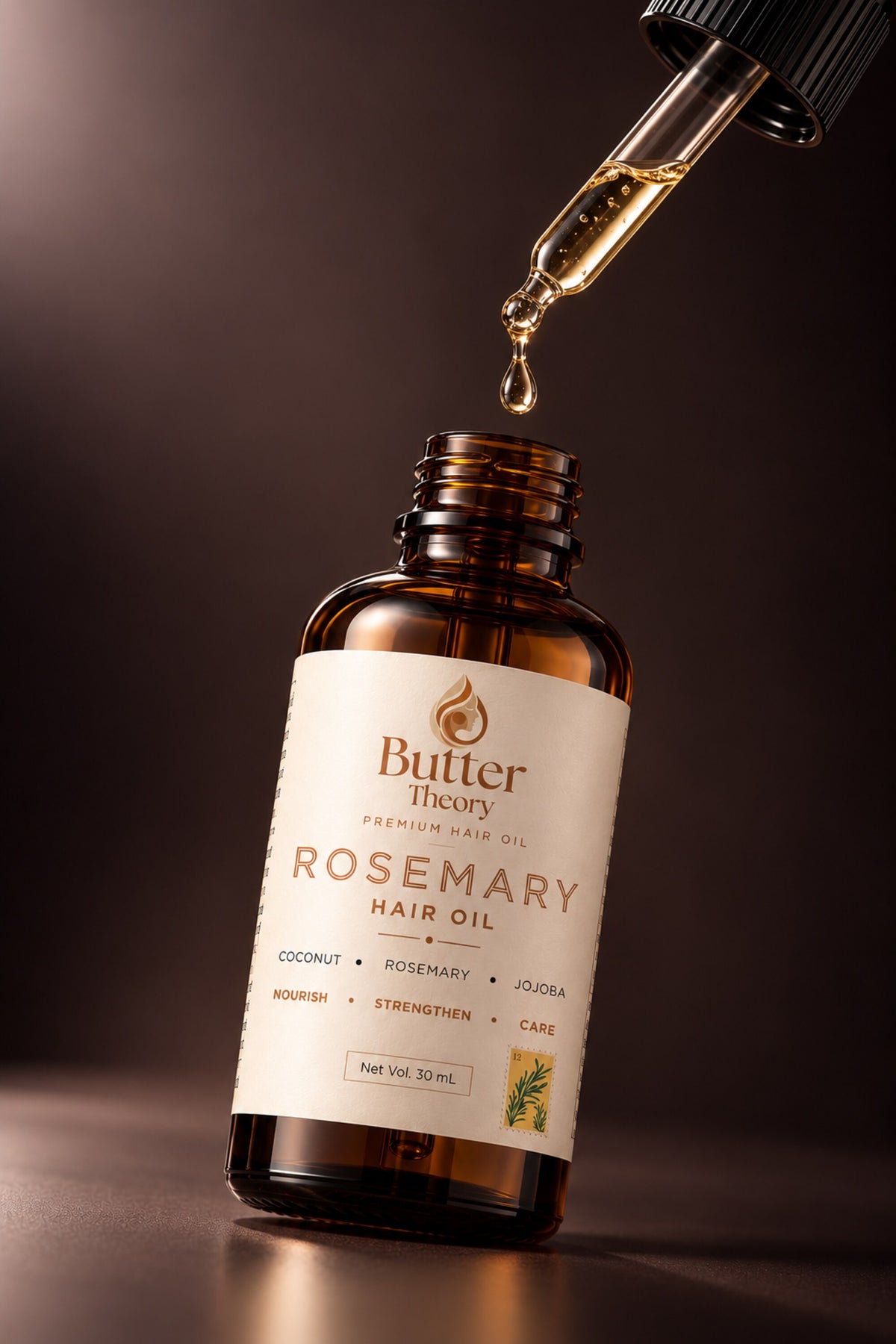 An amber glass bottle of Butter Theory Rosemary Hair Oil with a white label, shown with a glass dropper above it dispensing golden oil against a dark brown background.